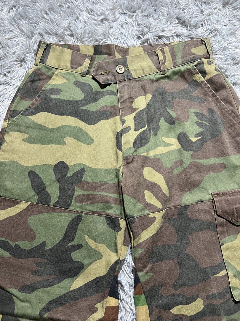 Camo Baggy Wide Leg Cargo Pants (Category: Jeans) located in Naga. Submitted by eighttttt (Listing ID 1458919504, Image 2). Description: - Unique camo patchwork design - Wide leg, cargo style - Button and zip front closure - Front and back pockets - Side cargo pockets - Perfect for a statement outfit.