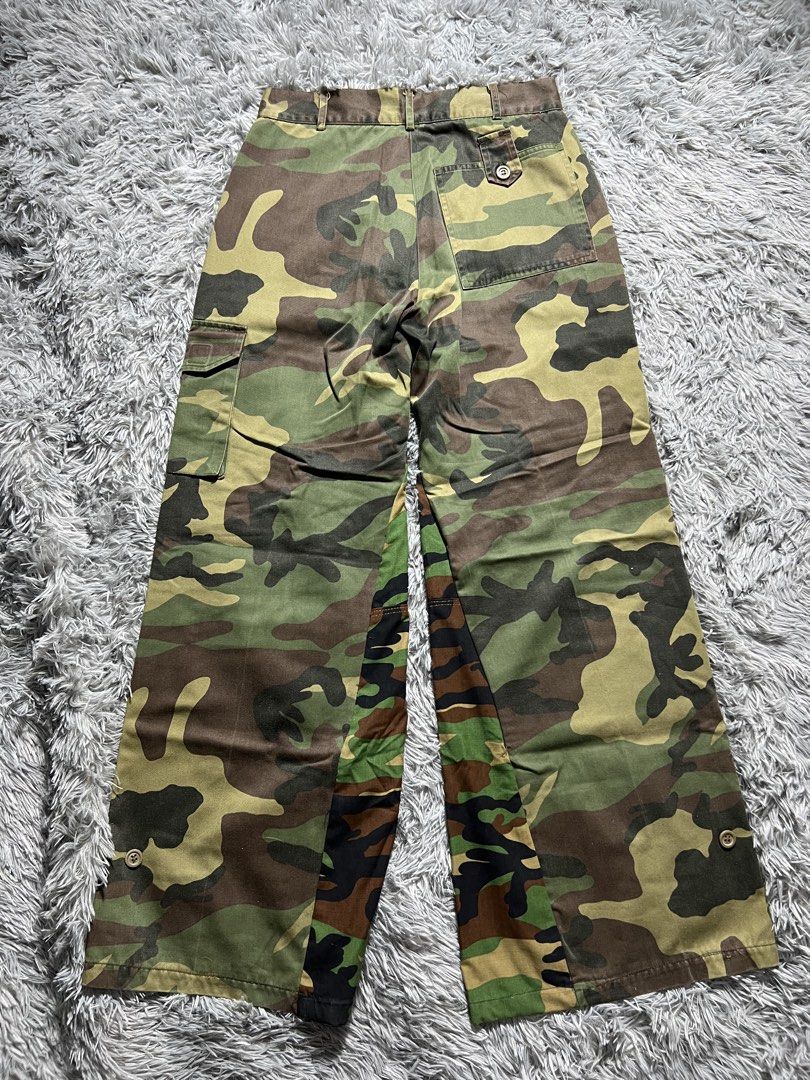 Camo Baggy Wide Leg Cargo Pants (Category: Jeans) located in Naga. Submitted by eighttttt (Listing ID 1458919504, Image 3). Description: - Unique camo patchwork design - Wide leg, cargo style - Button and zip front closure - Front and back pockets - Side cargo pockets - Perfect for a statement outfit.
