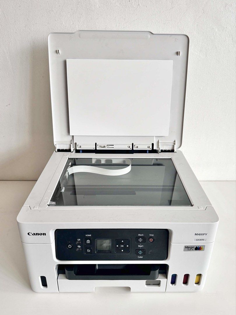 Canon MAXIFY GX3070 Mega Tank Printer (Category: Printers, Scanners & Copiers) located in Manila. Submitted by shop.aija (Listing ID 1458996181, Image 2). Description: USED ONCE. LIKE NEW. IN MINT CONDITION. CANON PIGMENT INK ALREADY FILLED (CMYK) Selling our Canon MAXIFY GX3070, used ONLY ONCE and in excellent, like-new condition. Perfect for home, school, office, or small business use. Complete with original box, power cord, and included access
