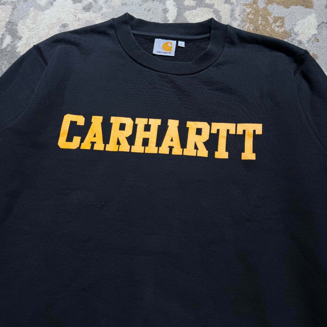 Carhartt Faculty Sweatshirt Black Yellow Logo (Category: Coats, Jackets and Outerwear) located in Dagupan City. Submitted by kiroshi12 (Listing ID 1458998913, Image 2). Description: - Authentic Black Carhartt sweatshirt - Yellow Carhartt logo across the chest - Ideal for casual everyday wear.