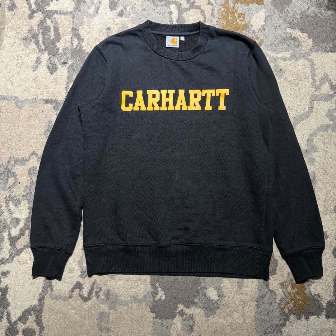 Carhartt Faculty Sweatshirt Black Yellow Logo (Category: Coats, Jackets and Outerwear) located in Dagupan City. Submitted by kiroshi12 (Listing ID 1458998913, Image 1). Description: - Authentic Black Carhartt sweatshirt - Yellow Carhartt logo across the chest - Ideal for casual everyday wear.