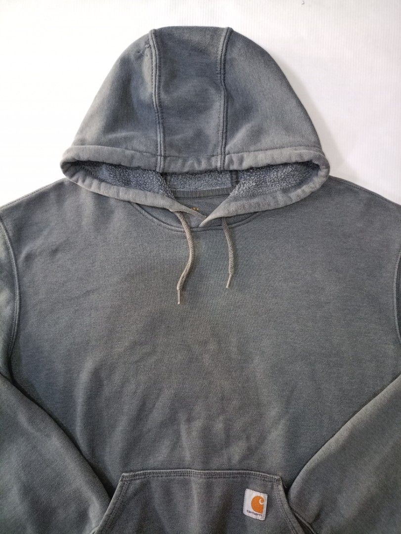 Carhartt Grey Pullover Hoodie Sweatshirt XL (Category: Coats, Jackets and Outerwear) located in Caloocan City. Submitted by grandturtle-371b8d (Listing ID 1458903190, Image 2). Description: - Grey Carhartt Hoodie - Size: XL - Material: Cotton and Polyester Blend - Style: Classic pullover with front pocket and drawstring hood - Condition: Great for everyday wear.