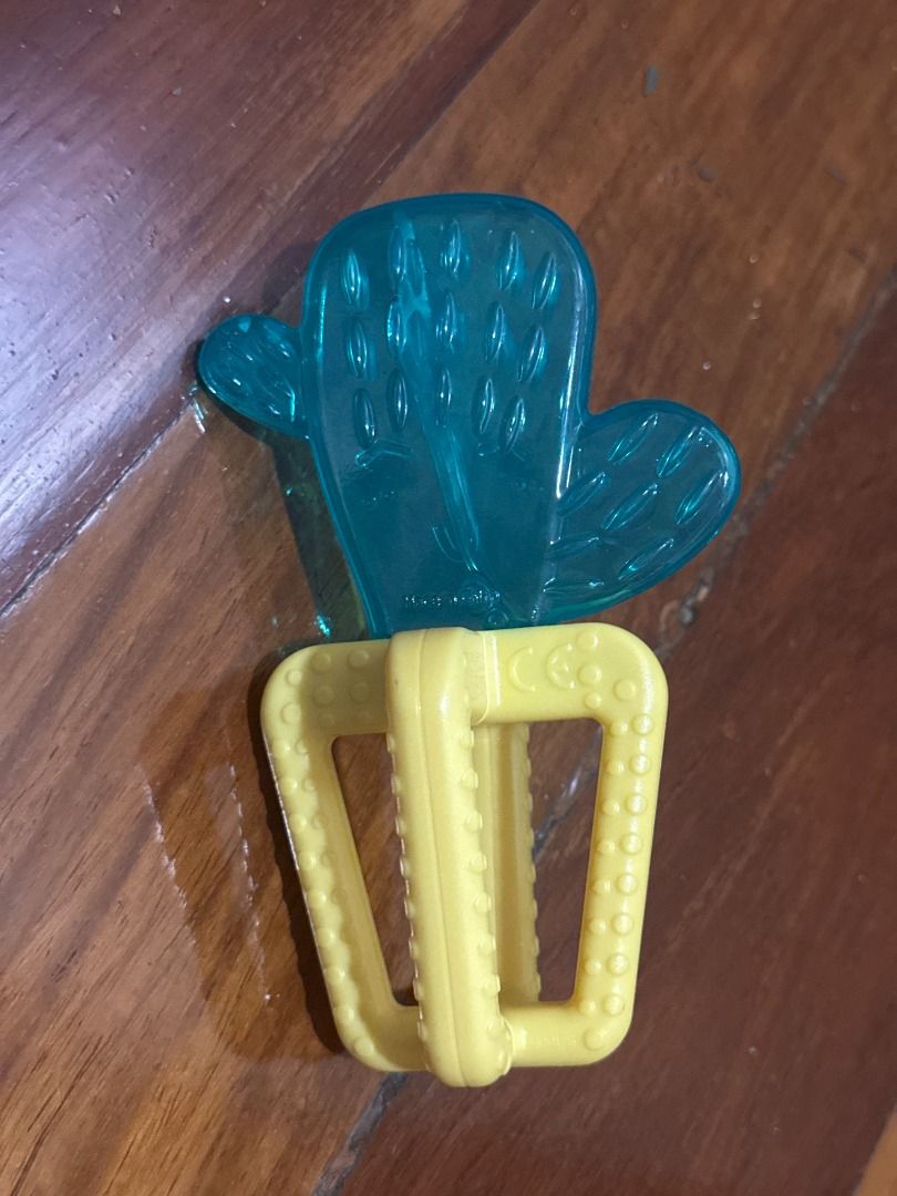 Chicco Newborn Refreshing Cooling Baby Teether, Design: Cactus (Category: Infant Playtime) located in Makati City. Submitted by travelfinds34611 (Listing ID 1458976045, Image 3). Description: GREAT CONDITION. USED 1-2x ONLY Chicco Newborn Refreshing Cooling Baby Teether, Design: Cactus - Cooling cactus teether for babies - Water-filled for refreshing relief - Multiple textures to soothe sore gums - Easy for little hands to grasp - Helps ease teet