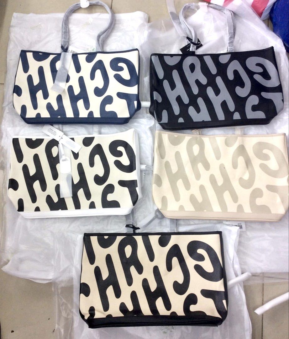 Christy Ng Logo Tote Bag (Category: Tote Bags) located in Bulacan. Submitted by mykakarizza (Listing ID 1459051622, Image 1). Description: NEW RELEASE✨✨ ₱980 only Christy Ng Logo Tote Bag Magnetic button closure 1 compartment, 1 zip pocket & 2 slip pocket 18" (L) x 11.5" (H) x 4.5" (W) Add paperbag 100 📸 Actual pics! 🙋🏻‍♀️.