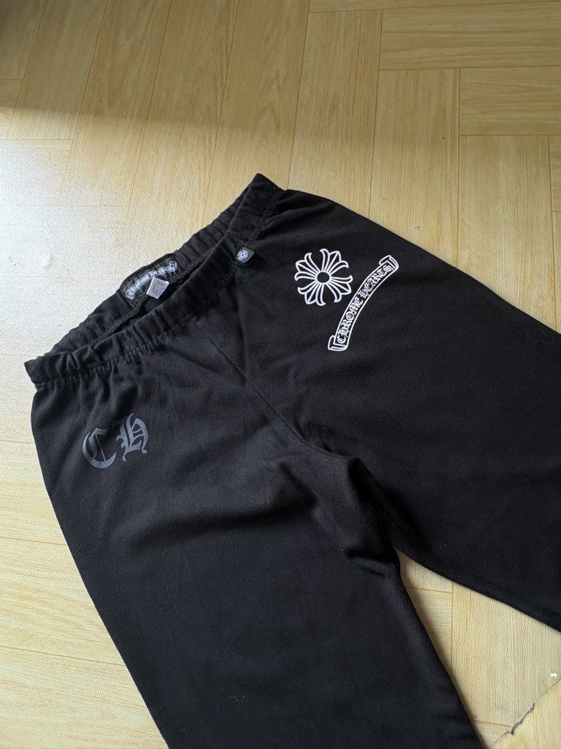 Chrome Hearts Black Pants (Category: Jeans) located in Iligan City. Submitted by seddicmoti2002 (Listing ID 1458961164, Image 2). Description: - Black pants with iconic Chrome Hearts branding. - Features the CH logo on the left thigh. - Showcases the Chrome Hearts cross logo on the right thigh. - Designed with an elastic waistband for ultimate comfort. - Ideal for everyday casual wear..