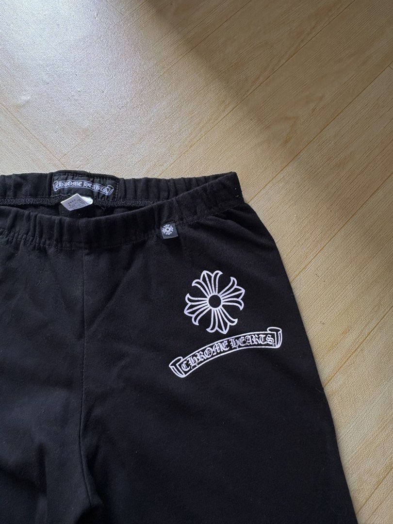 Chrome Hearts Black Pants (Category: Jeans) located in Iligan City. Submitted by seddicmoti2002 (Listing ID 1458961164, Image 3). Description: - Black pants with iconic Chrome Hearts branding. - Features the CH logo on the left thigh. - Showcases the Chrome Hearts cross logo on the right thigh. - Designed with an elastic waistband for ultimate comfort. - Ideal for everyday casual wear..