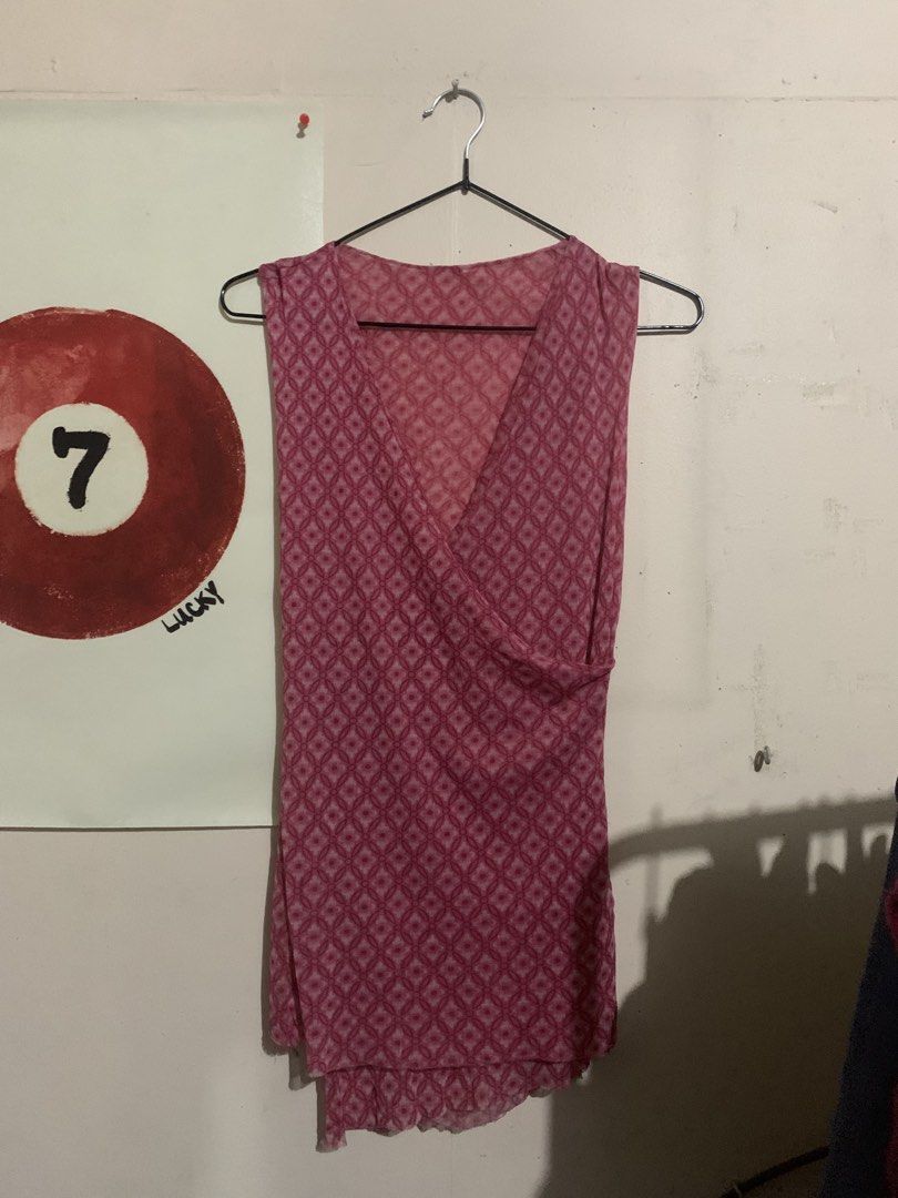 CLEARANCE SALE: Pink Wrap Top (Category: Blouses) located in Makati City. Submitted by krika.studio (Listing ID 1459061425, Image 3). Description: - geometric pattern - Flattering V-neckline - Flowy hem .