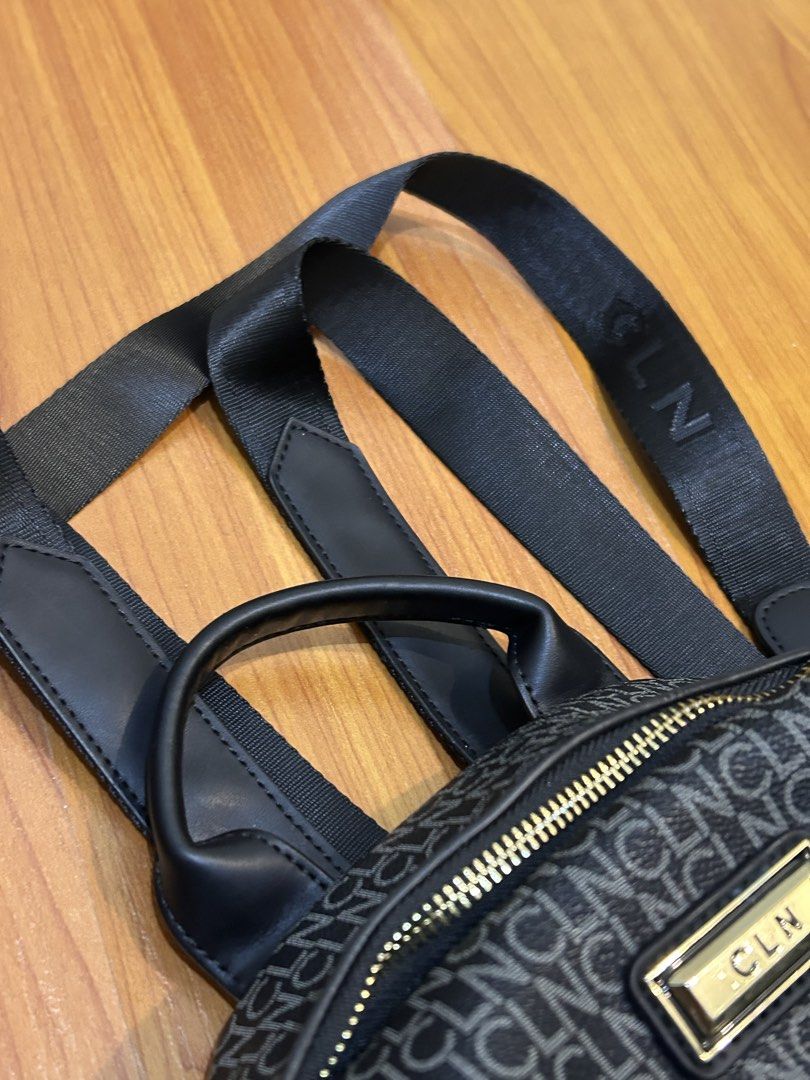 CLN Monogram Backpack Bag (Category: Backpacks) located in Mandaluyong City. Submitted by z90n11 (Listing ID 1458989975, Image 3). Description: - CLN Monogram Backpack - All-over CLN logo print - Gold hardware details - Adjustable straps for comfort - Top handle for carrying - Zipped main compartment - Front pocket - Side pocket - Ideal for everyday use.