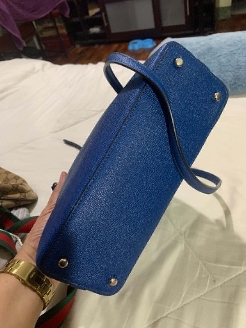 Coach Pebble Leather Dome Satchel Bag Blue (Category: Luxury Bags & Wallets) located in Manila. Submitted by fleurdebelle (Listing ID 1459056284, Image 2). Description: Authentic blue Coach satchel bag in pebble leather with silver hardware. Features top handles, detachable crossbody strap, zipper closure, protective feet, and a small Coach tag. Price is negotiable. MOP: Gcash/Gotyme.