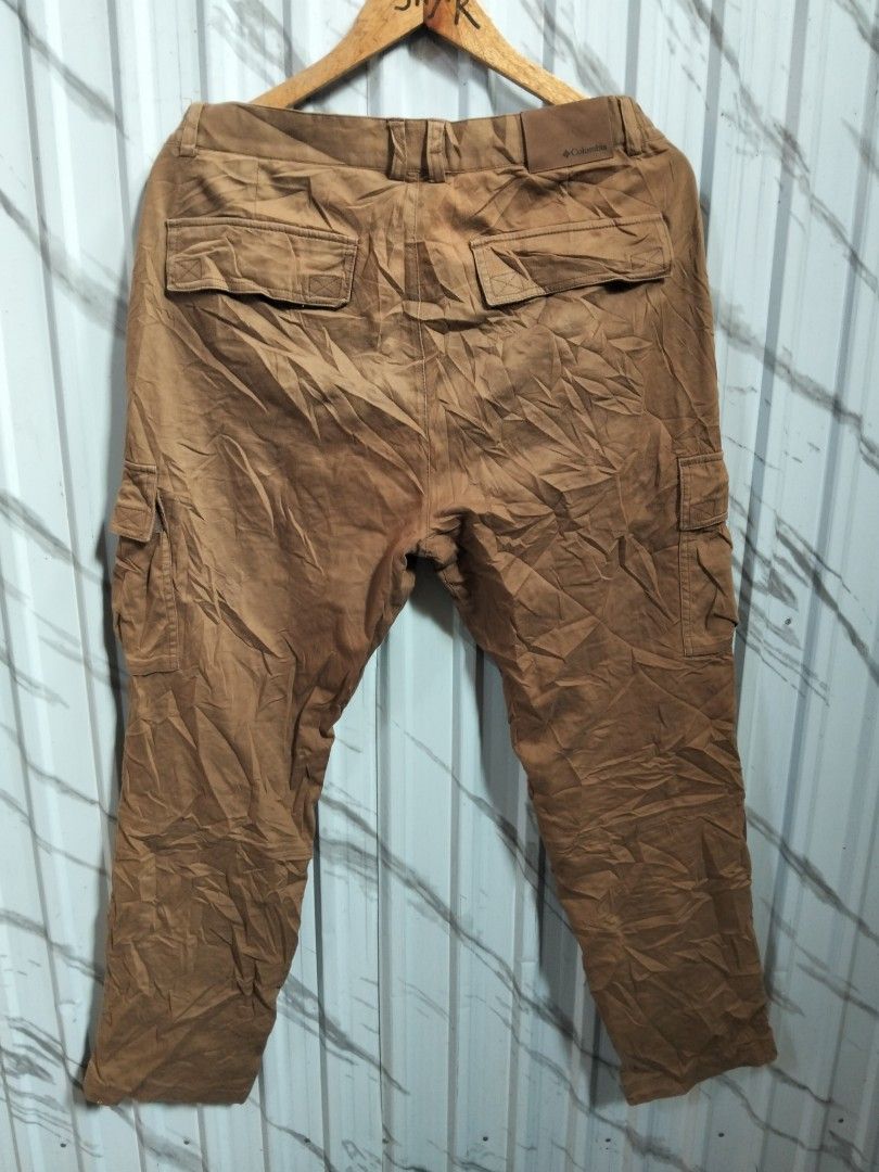 Columbia Cargo Pants Brown Size M (Category: Other Bottoms) located in Manila. Submitted by brarynpag30556 (Listing ID 1458952556, Image 2). Description: - Brand: Columbia - Color: Brown - Style: Cargo Pants - Size: Medium (M) - Features: Elastic waistband with button and zip closure, multiple front and side pockets, back pockets with button closure - Ideal for: Outdoor activities, casual wear.