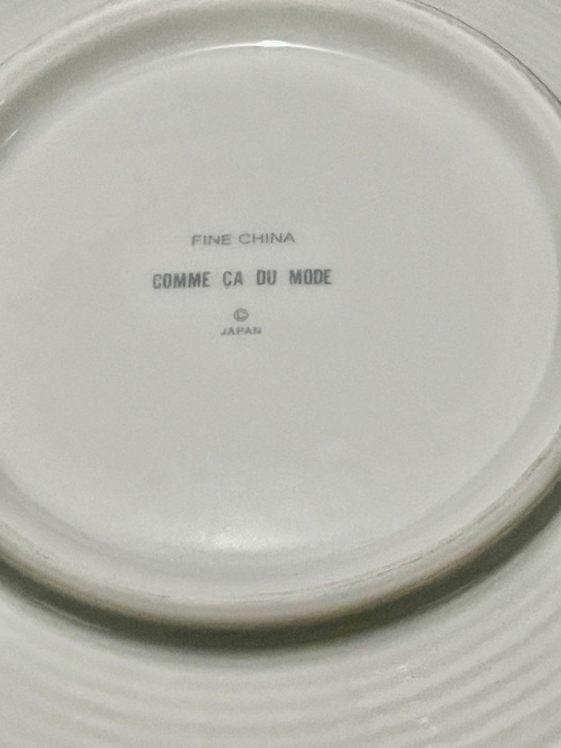 Comme Ça Du Mode Plates Set (Category: Dinnerware & Cutlery) located in Pasig City. Submitted by samotsari (Listing ID 1459030937, Image 2). Description: - Set Comme Ça Du Mode plates - Includes one large serving plate and five small plates - Features a light blue gradient detail on both - Comes in original black box with protective packaging (old box) - Ideal for serving food or as decorative display pieces -Unused; box not in mint condition.