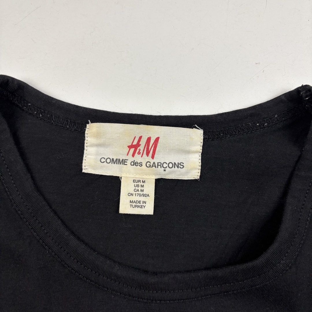 Comme des Garçons x H&M Shirt (Category: Shirts) located in Makati City. Submitted by ragrepository (Listing ID 1459015898, Image 3). Description: Comme des Garçons x H&M Shirt Tagged as Medium Length- 24.5” Pit to pit- 18” Sleeves- 7.5” Shoulder-15” Condition-9/10 Flaw- None .