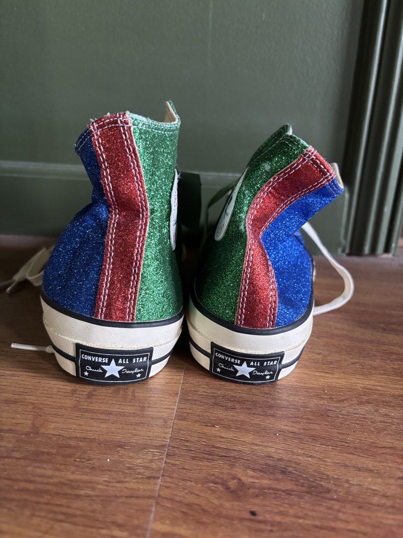 Converse x JW Anderson Glitter Sneakers (Category: Sneakers) located in Cainta. Submitted by doverparfum (Listing ID 1459001969, Image 3). Description: - Sparkly Converse high tops - JW Anderson collaboration - Glittery blue and green design - Red accents on the heel - Classic Chuck Taylor style - Size 9 Men's / 40 EU Pls note this is MPO.