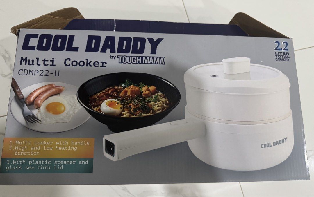 Cool Daddy Multi Cooker by Tough Mama CDMP22-H 2.2L (Category: Cookers) located in Las Pinas. Submitted by vanethneth (Listing ID 1459001021, Image 1). Description: - Tough Mama Cool Daddy Multi Cooker (Model CDMP22-H) - Generous 2.2 Liter total capacity - Versatile High and Low heating functions - Comes with a convenient plastic steamer - Features a see-thru glass lid for easy monitoring - Rated Voltage: 230V a.c. - Rated Power: 700 Watts - Freq