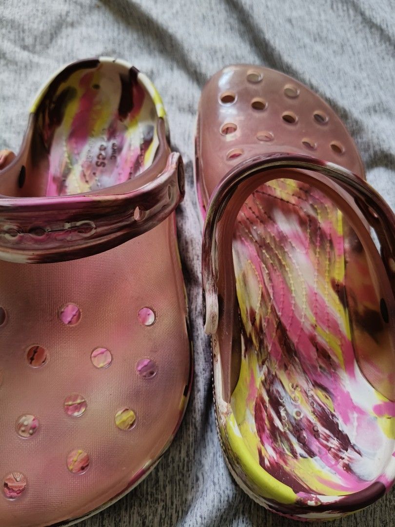orig.crocs Classic Tie-Dye Clogs Pink Yellow Brown (Category: Slippers and slides) located in Marikina City. Submitted by lorence11 (Listing ID 1458968198, Image 2). Description: - Fun tie-dye Crocs clogs - Pink, yellow, and brown swirl pattern - Translucent pink exterior - Easy slip-on and off design - Ideal for casual wear or around the house.