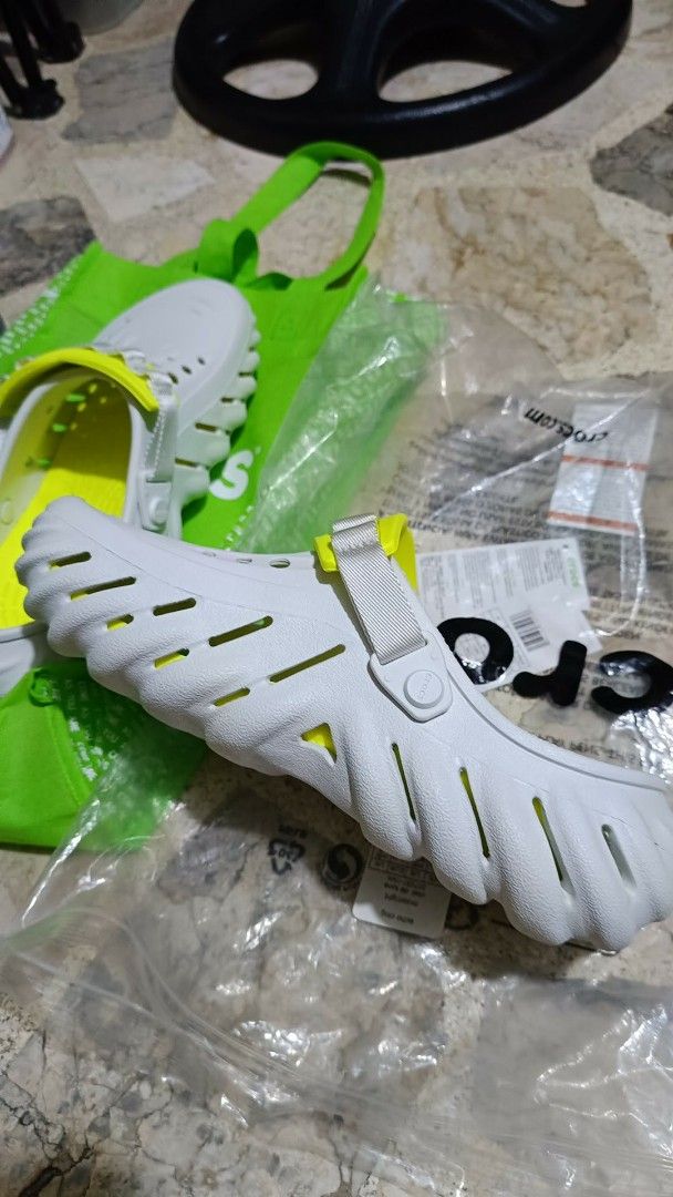 Crocs Echo Clog Moonlight (Category: Slippers & Slides) located in Pasig City. Submitted by Ranvel_jay (Listing ID 1458892037, Image 3). Description: - Brand new Crocs Echo Clog - Color: Moonlight White with Neon Yellow accents - Size: Unisex M9 / W11 - Condition: Still in original packaging - Features: Comfy and stylish for everyday wear - Original, Authentic 💯 - style code : 207937-1NK - SM mall price / srp 4,495.