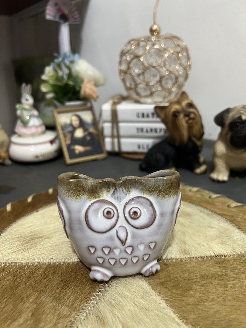 Cute Ceramic Owl Planter Pot for Small Plants (Category: Pots & Planters) located in Las Pinas. Submitted by maple0305 (Listing ID 1459035646, Image 1). Description: - Adorable owl-shaped ceramic pot - Perfect for succulents or small desk plants - Includes a drainage hole for healthy roots - Features a beautiful, earthy-toned glaze - Adds a touch of whimsy to your decor - Approximately 4 inches tall.