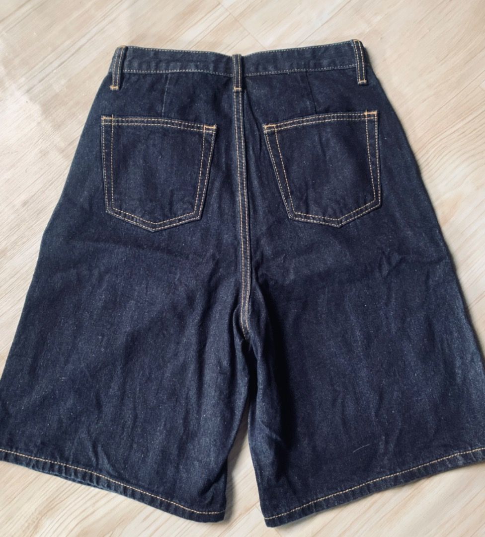Dark Wash Denim Bermuda Shorts (Category: Shorts) located in Piddig. Submitted by yhanshop (Listing ID 1458924954, Image 2). Description: - Dark wash denim shorts - Knee-length cut - Classic five-pocket styling - Button and zip closure - Stitching detail throughout - Ideal for casual wear.