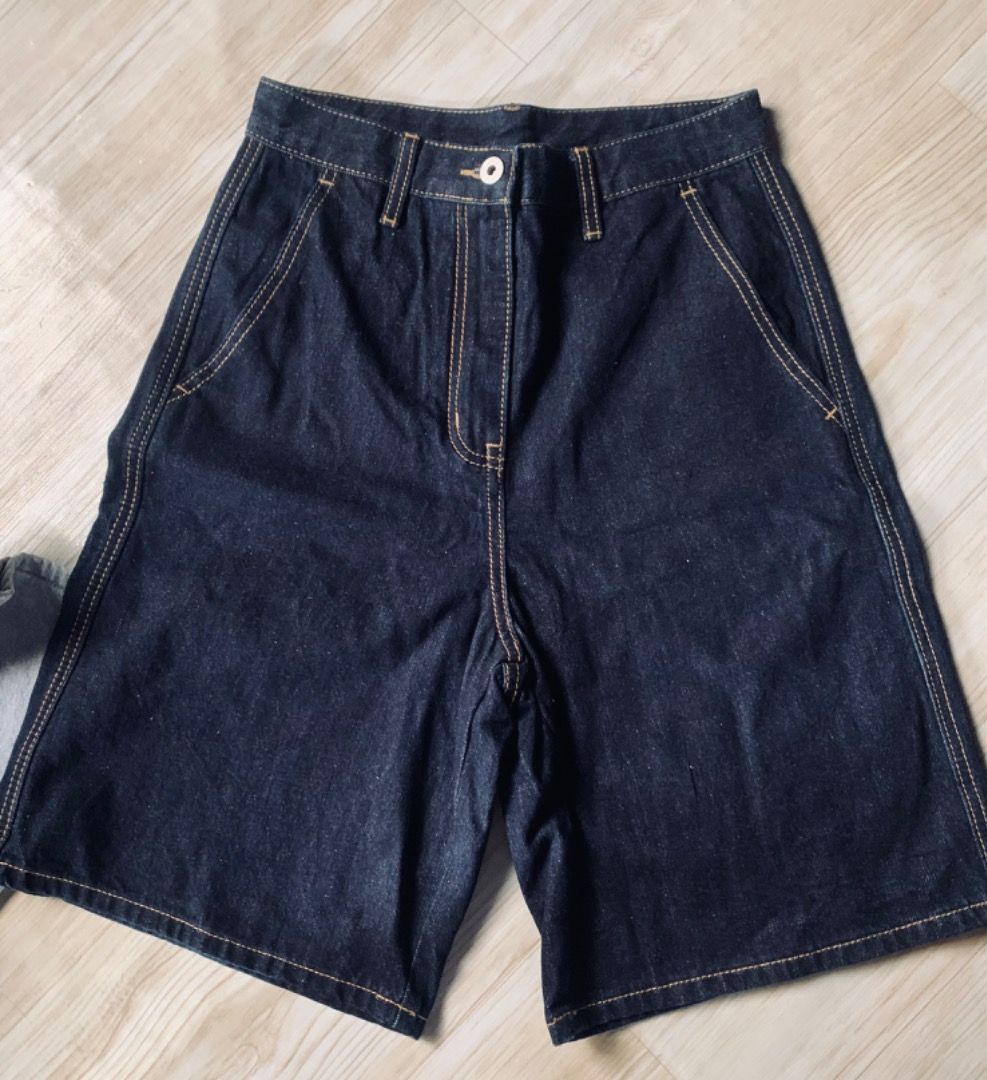 Dark Wash Denim Bermuda Shorts (Category: Shorts) located in Piddig. Submitted by yhanshop (Listing ID 1458924954, Image 1). Description: - Dark wash denim shorts - Knee-length cut - Classic five-pocket styling - Button and zip closure - Stitching detail throughout - Ideal for casual wear.