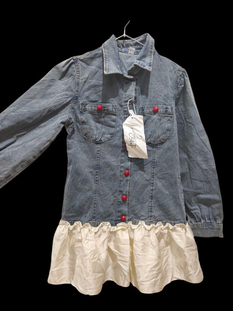 Denim jacket with Ruffle Hem w/tag (Category: Dresses) located in Taguig. Submitted by deyerreC2020 (Listing ID 1459006960, Image 2). Description: with tag pa Loc. Taguig! pullouts good quality Cute denim tops/dress, size M denim . White ruffle hem, red front buttons down-up and pockets. Long sleeves with button cuffs. Perfect for casual wear. 80 % cotton MOP:gcash/Maya/cash first payment first to be serve 🤗💚 no2joyminer ------.