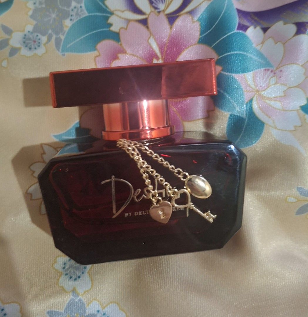 Destiny by Delta Goodrem Perfume 30 ml (Category: Fragrance & Deodorants) located in Iloilo. Submitted by rina101 (Listing ID 1458967917, Image 3). Description: - Authentic Destiny by Delta Goodrem perfume 30 ml - Unique dark red faceted bottle design - Shiny red cap - Ideal for perfume collectors or as a special gift.