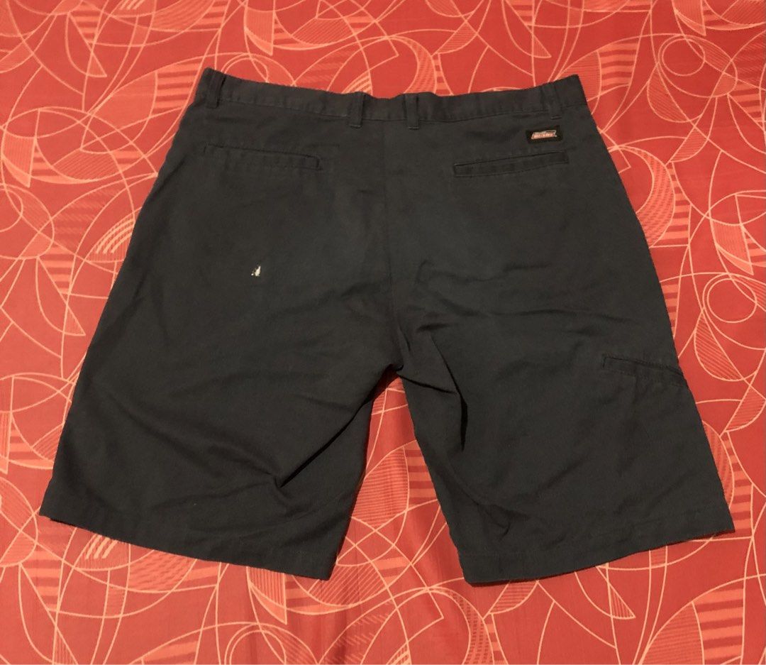 Dickies Men's Shorts Navy Blue Cargo Style (Category: Shorts) located in Manila. Submitted by gobvs222 (Listing ID 1459068182, Image 1). Description: - Navy blue Dickies cargo shorts - Classic fit, perfect for everyday wear - Functional side pockets - Signature Dickies logo patch on back pocket - Secure button and zip closure.