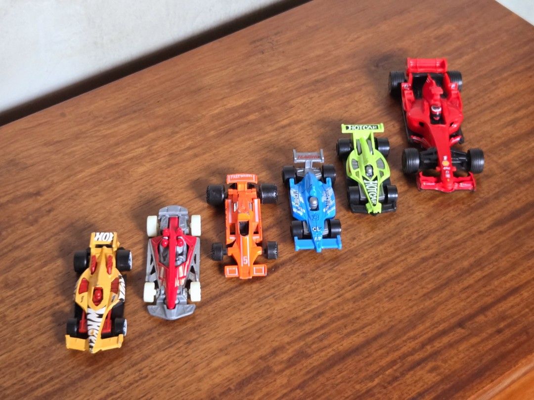 Diecast Formula 1 Racer Toy Car Set Hotwheels (Category: Vehicle & Diecast Models) located in Pasig City. Submitted by ge_borro (Listing ID 1452565176, Image 1). Description: Green Formula - Mint Blue Formula- Mint Orange Formula - Played HW Track Hammer - Near Mint HW Winning Formula - Played with FREE Shell Ferrari F2008 Take all at price posted.