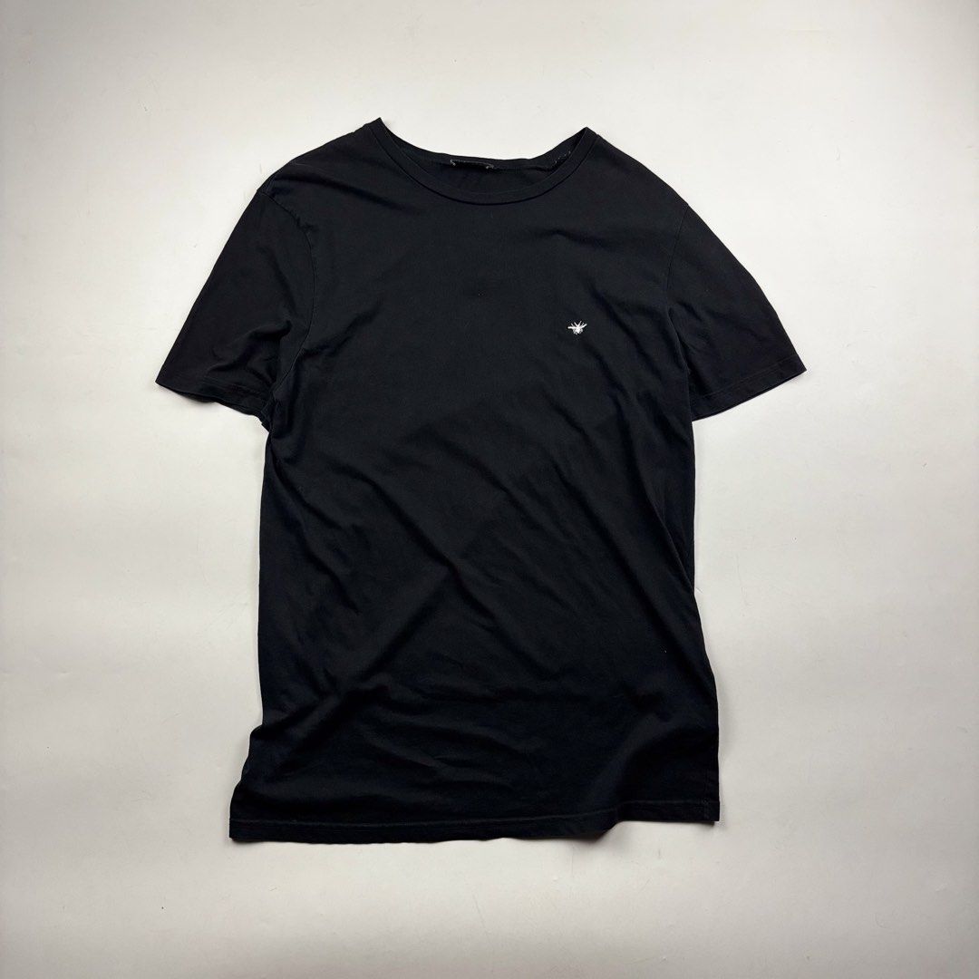 Dior Homme - Kris Van Assche- Bee Tshirt (Category: Tshirts & Polo Shirts ) located in Makati City. Submitted by ragrepository (Listing ID 1459015276, Image 1). Description: Dior Homme - Kris Van Assche- Bee Tshirt Tagged as Large Length- 29.5” Pit to pit- 20” Sleeves- 8.5” Shoulder-17.5” Condition-9/10 Flaw- None .