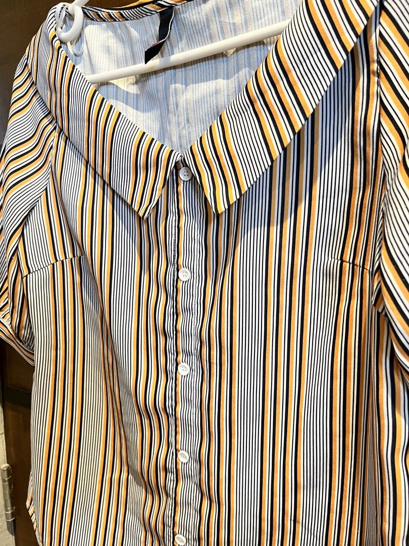 Emu Striped Button-Up Blouse with Collar (Category: Blouses) located in Las Pinas. Submitted by francesaly (Listing ID 1458974732, Image 2). Description: - Cute striped blouse from Emu - Features a wide collar and button-up front - Short puff sleeves - Vertical stripes in black, white, and orange-yellow - Versatile for casual or dressed-up occasions - Easy to pair with jeans or skirts.