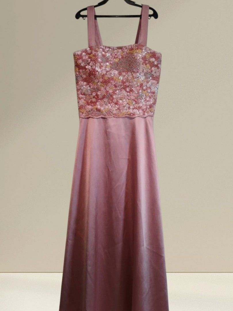 Enchanted Roselle Evening Gown (Category: Evening dresses & gowns) located in San Juan City. Submitted by exclusivelyours (Listing ID 1459066666, Image 1). Description: ​Elevate your next special event in this romantic, floor-length A-line gown in a dreamy dusty rose. ​Color: Dusty Rose / Mauve ​Details: Floral embroidery, sequin embellishments, scalloped bodice edge ​Silhouette: A-Line, full length ​Neckline: Straight neck with wide straps.