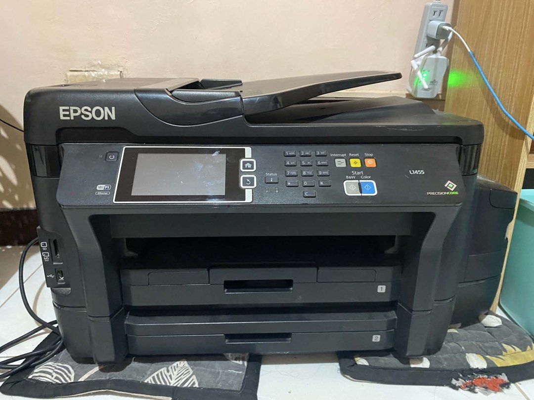 EPSON L1455 (2nd hand) (Category: Printers, Scanners & Copiers) located in Antipolo. Submitted by queens.collections (Listing ID 1458989385, Image 2). Description: Parts good as new. Newly replaced authentic parts Key SpecificationsFunctions: Print, scan, copy, and faxMax Print Size: Up to A3+Print Speed: Up to 32 ppm (black) and 20 ppm (color)Page Yield: Approximately 6,000 pages for black and 6,500 pages for colorDuplex Printing: Automatic A3 d