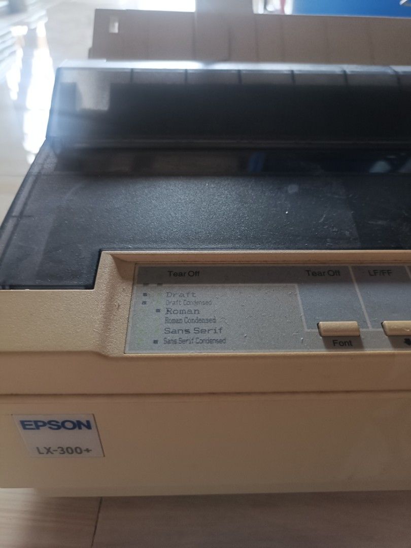 Epson LX-300+ Dot Matrix Printer (Category: Printers, Scanners & Copiers) located in Quezon City. Submitted by imquintano (Listing ID 1458950126, Image 1). Description: - Epson LX-300+ Dot Matrix Printer - Reliable workhorse for printing documents, receipts, and forms - Features various font options: Draft, Roman, Sans Serif - Includes Tear Off and LF/FF functions - Power cable included.