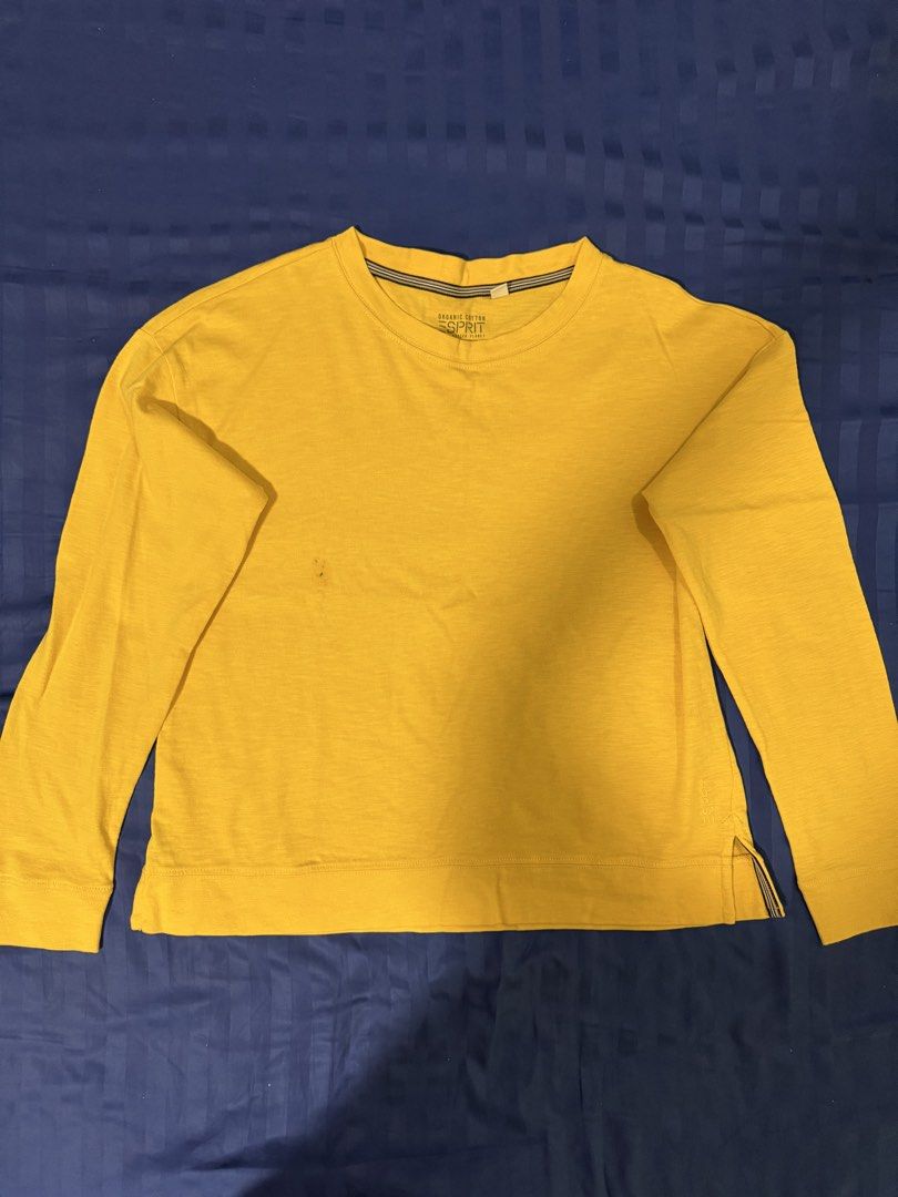 Esprit Organic Cotton Yellow Sweatshirt Size M (Category: Longsleeves) located in Quezon City. Submitted by candyclosetph (Listing ID 1459085242, Image 1). Description: - Esprit yellow long-sleeved sweatshirt - Size: Medium (M) - Material: Organic Cotton - Condition: Small stain on the front (please check photos) - Features: Side slits with striped detail - Style: Comfortable and casual.