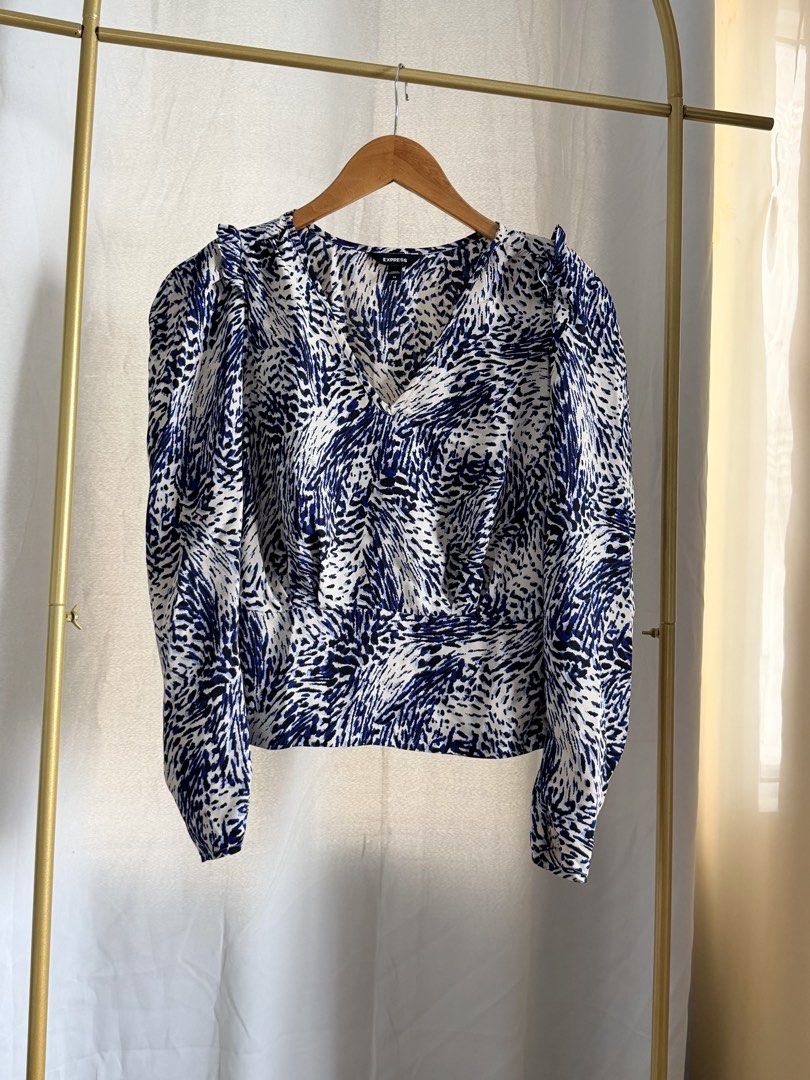 Express Top XS 🥰 Blue Pattern Blouse (Category: Others Tops) located in Taguig. Submitted by love_preloved__ (Listing ID 1458903257, Image 1). Description: Another winner top. Excellent condition. Fabric is so smooth to the skin. Very flattering to wear. 🥰😍 Got this for almost 3k. Very versatile top. Beautiful prints. .
