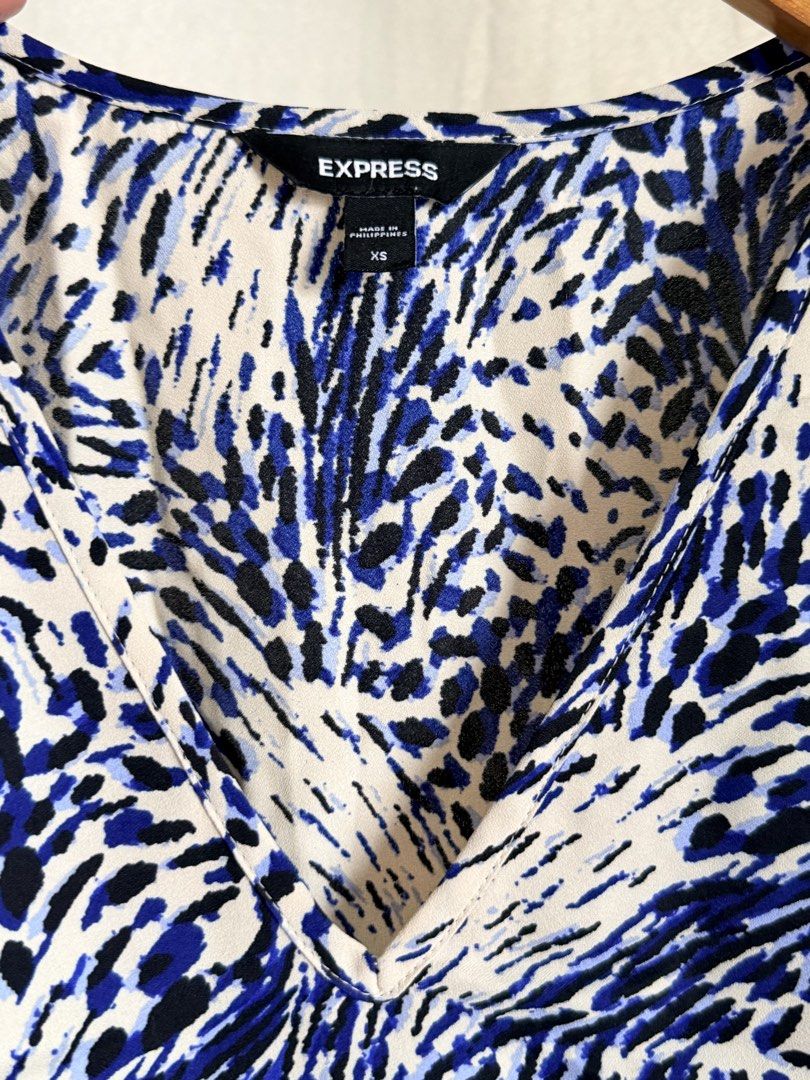 Express Top XS 🥰 Blue Pattern Blouse (Category: Others Tops) located in Taguig. Submitted by love_preloved__ (Listing ID 1458903257, Image 2). Description: Another winner top. Excellent condition. Fabric is so smooth to the skin. Very flattering to wear. 🥰😍 Got this for almost 3k. Very versatile top. Beautiful prints. .