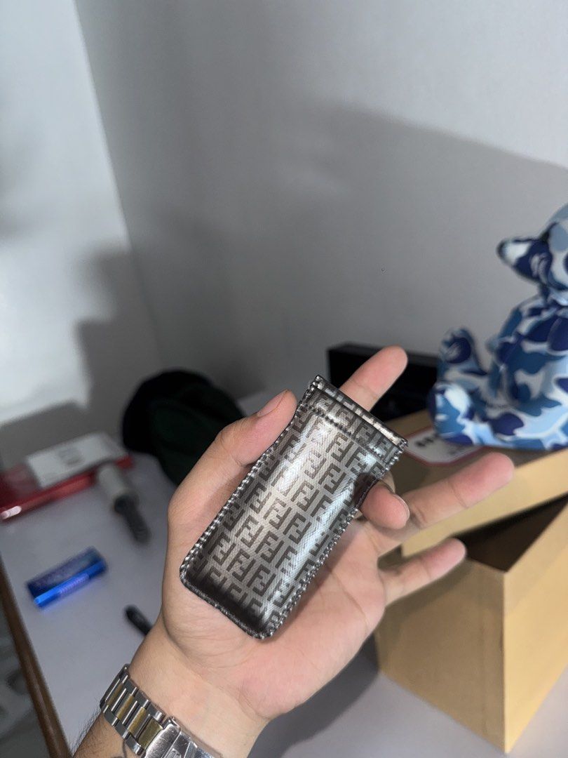 Fendi zucca lighter (Category: Luxury Accessories) located in Manila. Submitted by isseyboi (Listing ID 1459085498, Image 2). Description: Fendi lighter with case bnew refillable .