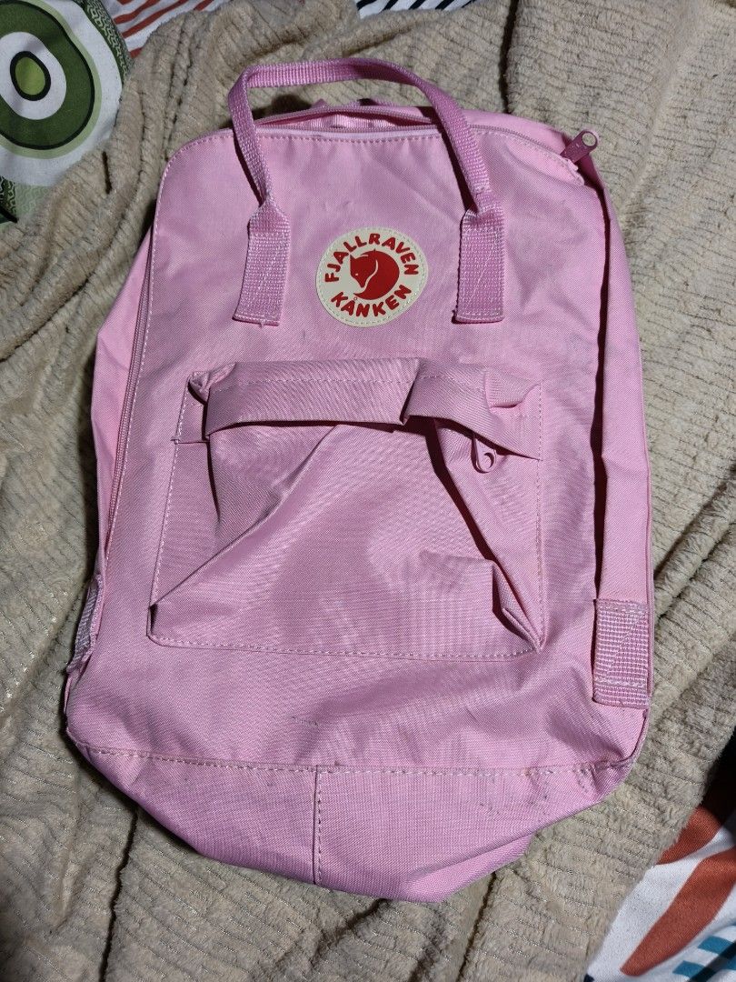 Fjallraven Kanken Pink Backpack (Category: Backpacks) located in Quezon City. Submitted by bagsareus428 (Listing ID 1458961729, Image 1). Description: - Pink Fjallraven Kanken backpack - Classic design with front pocket and spacious main compartment - Adjustable shoulder straps for personalized comfort - Interior name and address label - Made from durable, water-resistant Vinylon F fabric - Perfect for school, work, or everyday adventures.