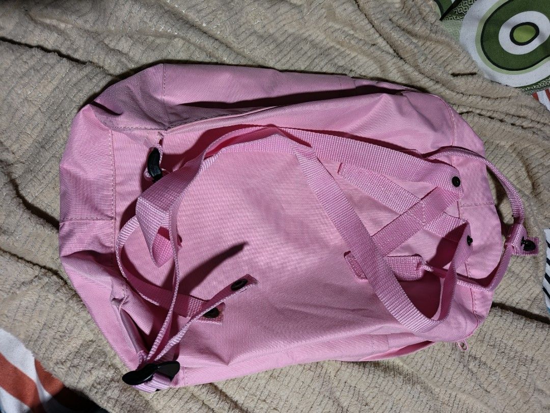 Fjallraven Kanken Pink Backpack (Category: Backpacks) located in Quezon City. Submitted by bagsareus428 (Listing ID 1458961729, Image 3). Description: - Pink Fjallraven Kanken backpack - Classic design with front pocket and spacious main compartment - Adjustable shoulder straps for personalized comfort - Interior name and address label - Made from durable, water-resistant Vinylon F fabric - Perfect for school, work, or everyday adventures.