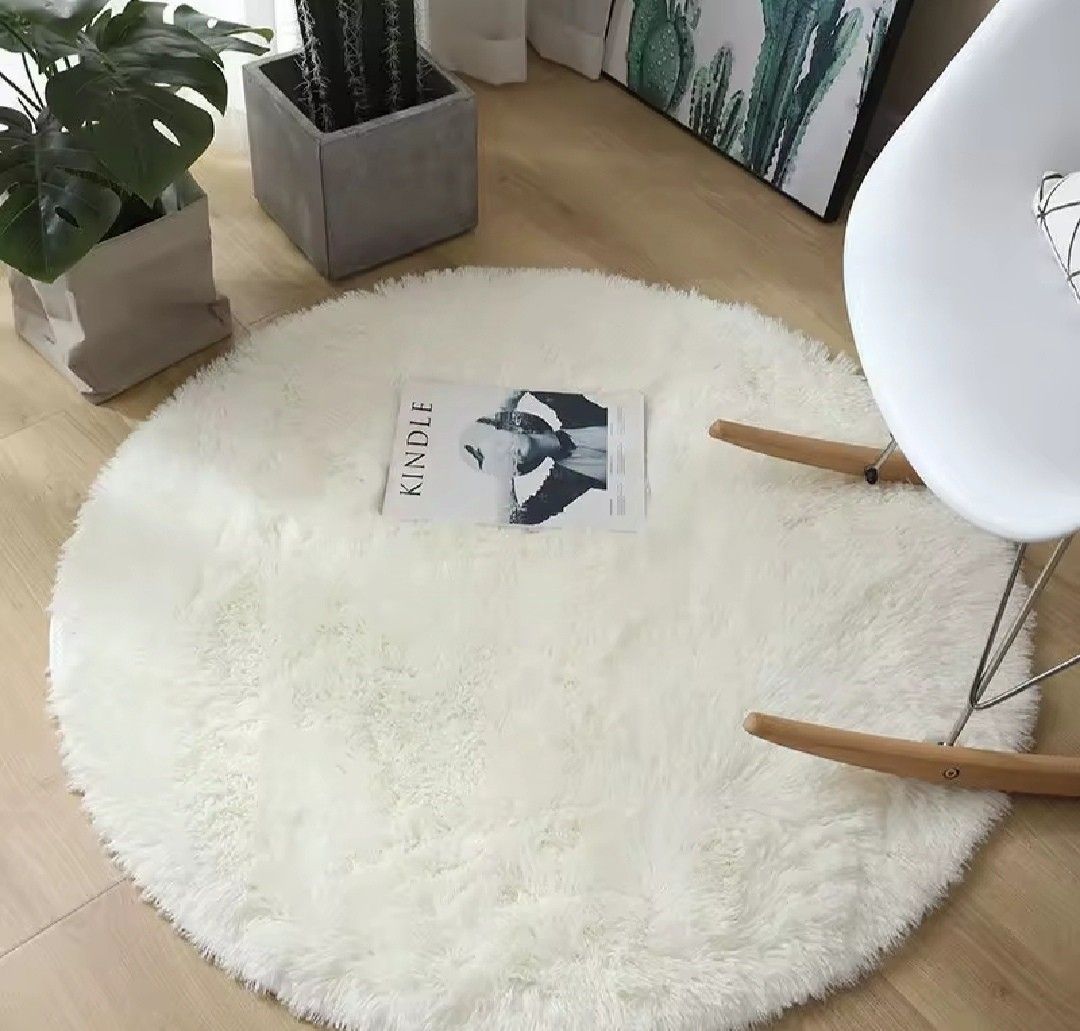 Fluffy Round Rug - White (Category: Carpets, Mats & Flooring) located in Mandaluyong City. Submitted by perfectfashion.mnl (Listing ID 1458914560, Image 1). Description: - Super soft and fluffy round rug - Perfect for living rooms or bedrooms - Creates a cozy atmosphere - Easy to maintain and clean - 60cmx60cm.