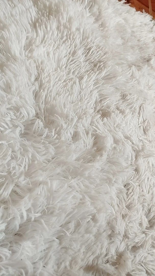 Fluffy Round Rug - White (Category: Carpets, Mats & Flooring) located in Mandaluyong City. Submitted by perfectfashion.mnl (Listing ID 1458914560, Image 3). Description: - Super soft and fluffy round rug - Perfect for living rooms or bedrooms - Creates a cozy atmosphere - Easy to maintain and clean - 60cmx60cm.