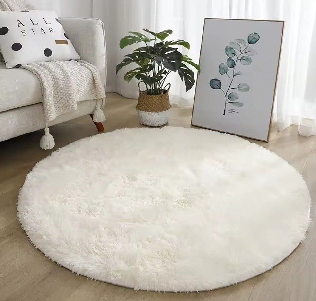 Fluffy Round Rug - White (Category: Carpets, Mats & Flooring) located in Mandaluyong City. Submitted by perfectfashion.mnl (Listing ID 1458914560, Image 2). Description: - Super soft and fluffy round rug - Perfect for living rooms or bedrooms - Creates a cozy atmosphere - Easy to maintain and clean - 60cmx60cm.