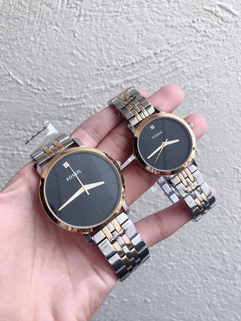 Fossil His & Her Lux Luther Two Tone (Category: Women's Watches) located in Las Pinas. Submitted by luxlahvu2017 (Listing ID 1458981615, Image 1). Description: - Set of two Fossil watches, perfect for couples. - Elegant black dial with gold-tone hands and markers. - Stylish two-tone silver and gold watch bands. - One watch is slightly larger, designed for a coordinated look..