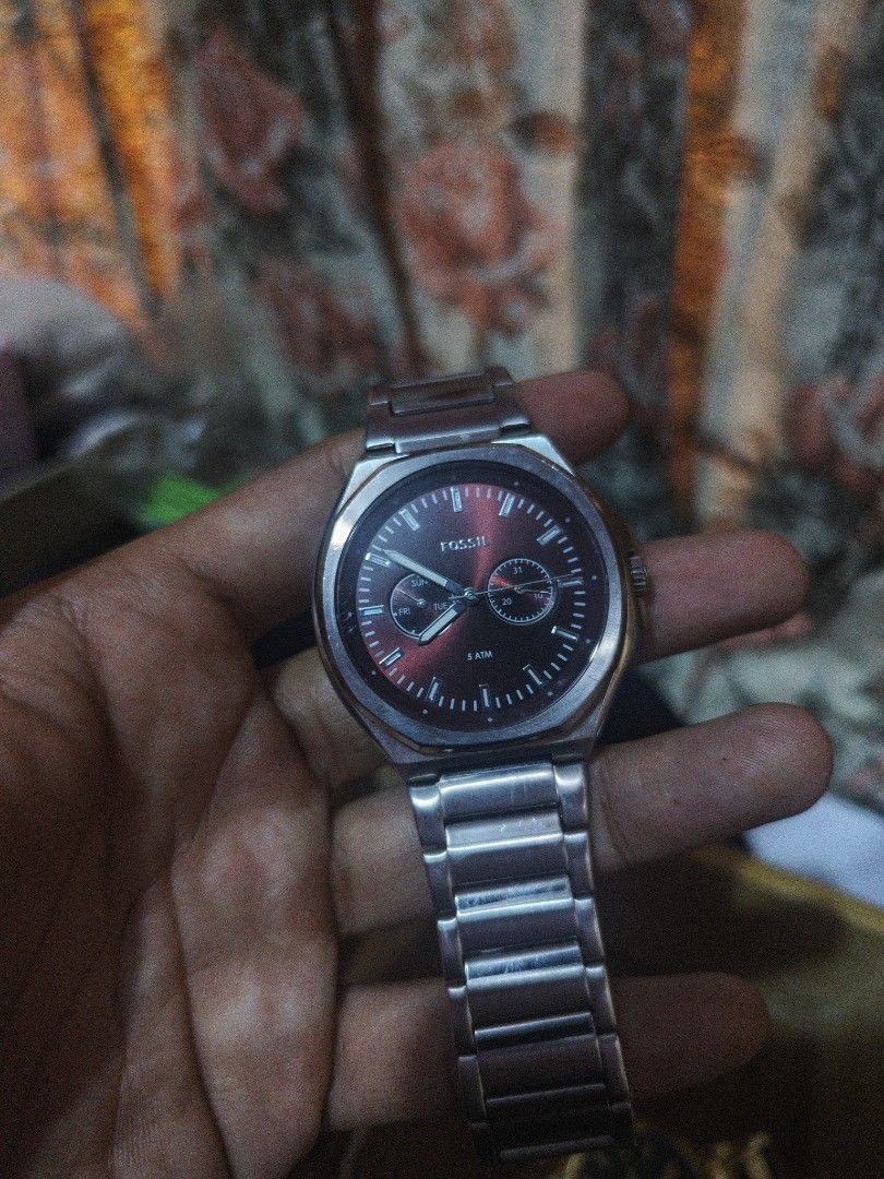 Fossil Watch - Men's Stainless Steel (Category: Men's Watches) located in Muntinlupa City. Submitted by kidcht (Listing ID 1458894923, Image 1). Description: - Fossil Stainless Steel Watch - Sleek stainless steel band and casing - Striking dark red dial - Convenient day and date functions - Water resistant up to 5 ATM - Versatile for everyday wear or special occasions - Feel free to ask any questions!.