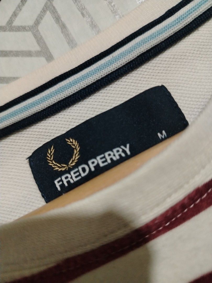 FRED PERRY STRIPE TEE (Category: Tshirts & Polo Shirts ) located in Angeles City. Submitted by ava.collection (Listing ID 1458969987, Image 3). Description: AUTHENTIC/LEGIT EXCELLENT CONDITION GOOD AS NEW 9.8/10 COLOR RATE DM 📩 📍 REMINDERS Please read the item details before purchasing. Color may vary due to lighting. These items are thrifted, so please manage your expectations..