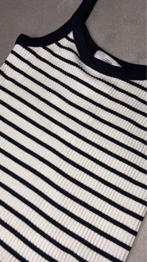 Frill Fitted Top (Category: Others Tops) located in Carmona. Submitted by camille.02 (Listing ID 1458927960, Image 3). Description: Color: B & W Striped Top Size: Small Stretchable MOP: Gcash or Bank Transfer only Note: Color may vary due on lighthings.