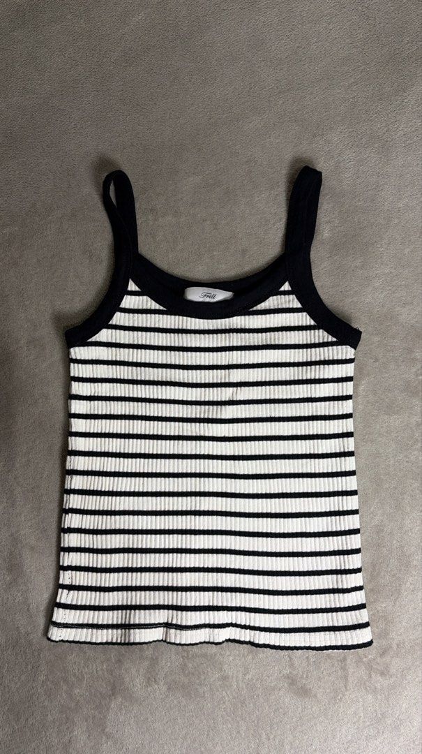 Frill Fitted Top (Category: Others Tops) located in Carmona. Submitted by camille.02 (Listing ID 1458927960, Image 1). Description: Color: B & W Striped Top Size: Small Stretchable MOP: Gcash or Bank Transfer only Note: Color may vary due on lighthings.