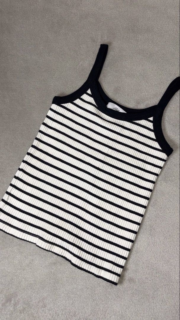 Frill Fitted Top (Category: Others Tops) located in Carmona. Submitted by camille.02 (Listing ID 1458927960, Image 2). Description: Color: B & W Striped Top Size: Small Stretchable MOP: Gcash or Bank Transfer only Note: Color may vary due on lighthings.