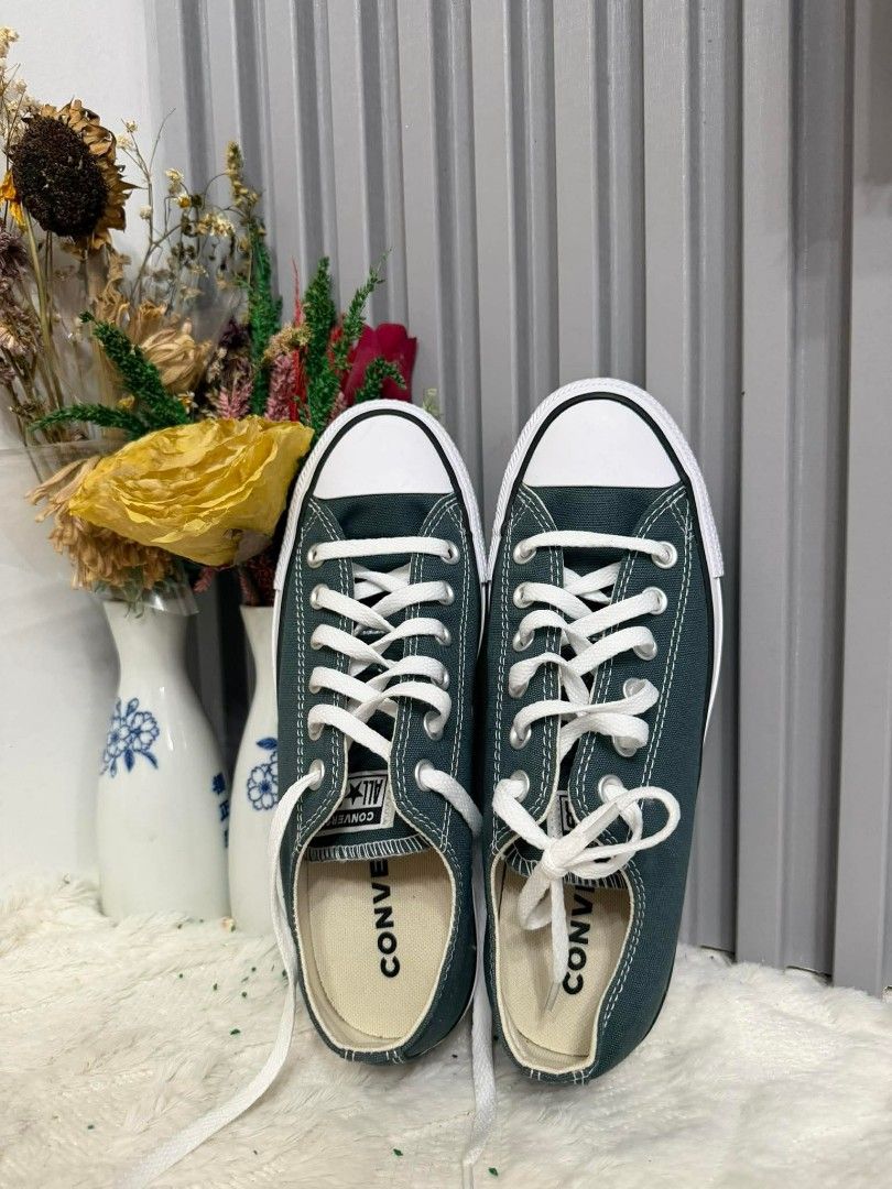 Fs Converse (Category: Casual Shoes) located in Manila. Submitted by anngvalle (Listing ID 1458933002, Image 1). Description: for sale dark green Converse Chuck Taylor All Star low-top sneakers featuring classic white laces and rubber toe caps.