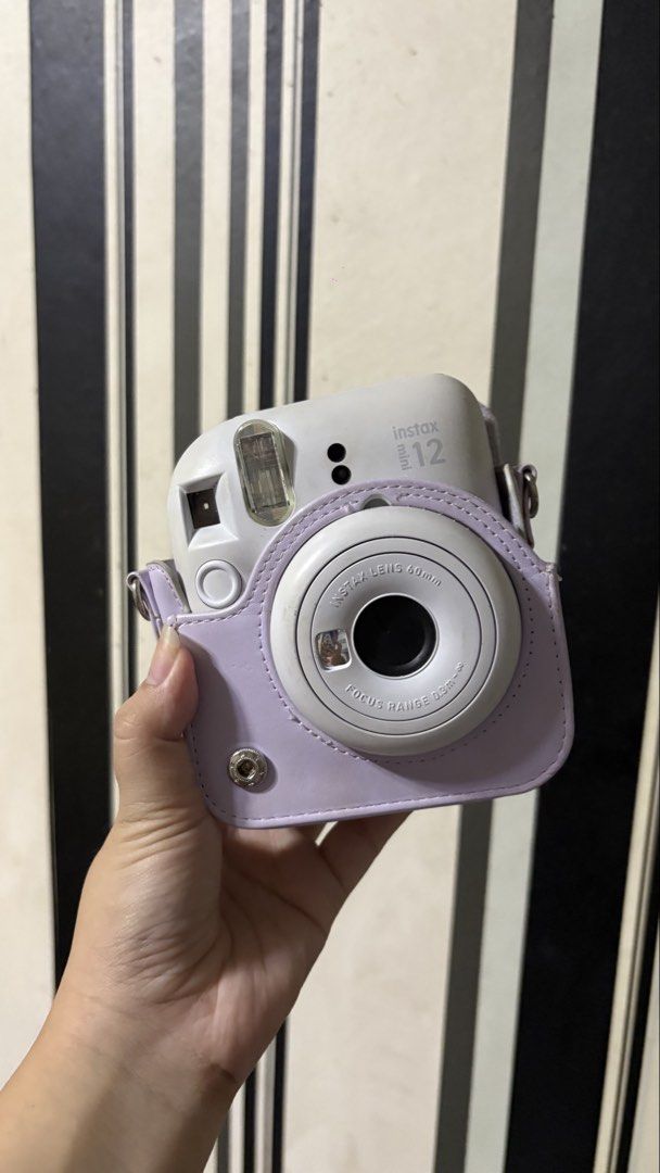 Fujifilm Instax Mini 12 Camera (WHITE) (Category: Cameras) located in Manila. Submitted by mybemcd (Listing ID 1459025554, Image 1). Description: - Fujifilm Instax Mini 12 camera - with lilac case - Ideal for instant photo memories - Easy to use, fun for parties and daily moments - NO FILM AND BATTERY INCLUDED - no original box .