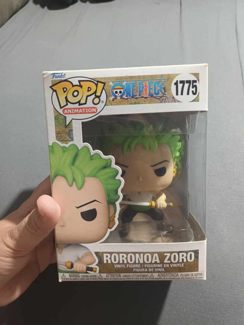 Funko Pop Animation One Piece Roronoa Zoro Figures (Category: Figurines & Statues) located in Abucay. Submitted by moonlitnook_bookshop (Listing ID 1458983208, Image 1). Description: Selling multiple Funko Pop figures of Roronoa Zoro from One Piece. Includes numbers 1775, 327, 923, and 2391. Also includes Stitch as Beast, number 1459. All figures are in their original boxes. Great collectibles for any fan..